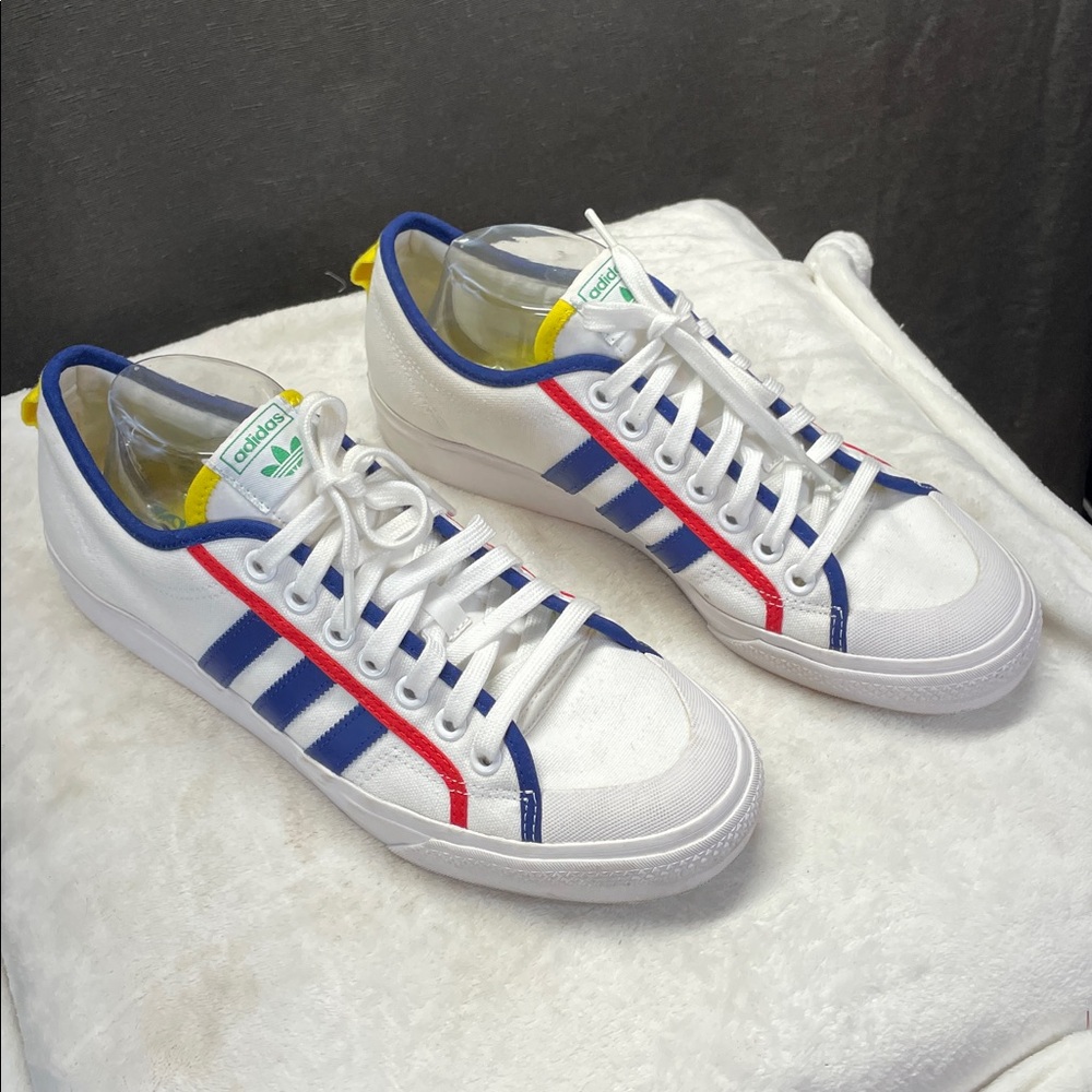 Adidas White Sneakers with Blue and Red Accents